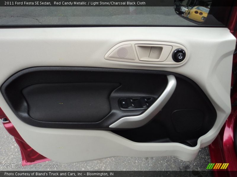Red Candy Metallic / Light Stone/Charcoal Black Cloth 2011 Ford Fiesta SE Sedan