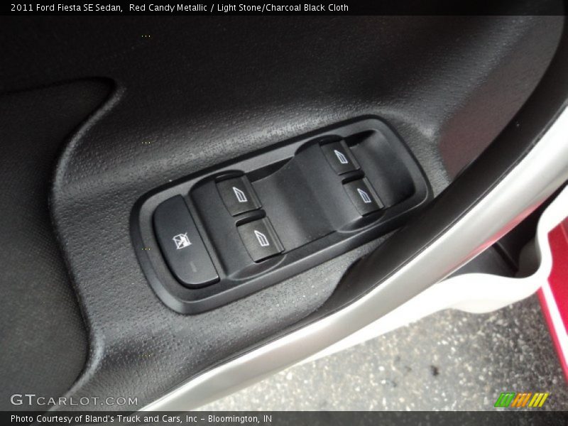 Red Candy Metallic / Light Stone/Charcoal Black Cloth 2011 Ford Fiesta SE Sedan