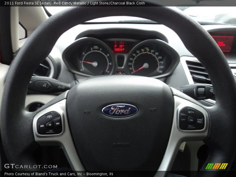 Red Candy Metallic / Light Stone/Charcoal Black Cloth 2011 Ford Fiesta SE Sedan