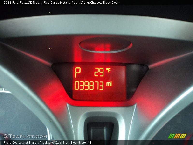 Red Candy Metallic / Light Stone/Charcoal Black Cloth 2011 Ford Fiesta SE Sedan