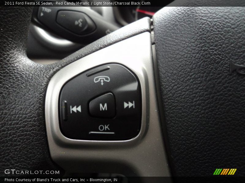 Red Candy Metallic / Light Stone/Charcoal Black Cloth 2011 Ford Fiesta SE Sedan
