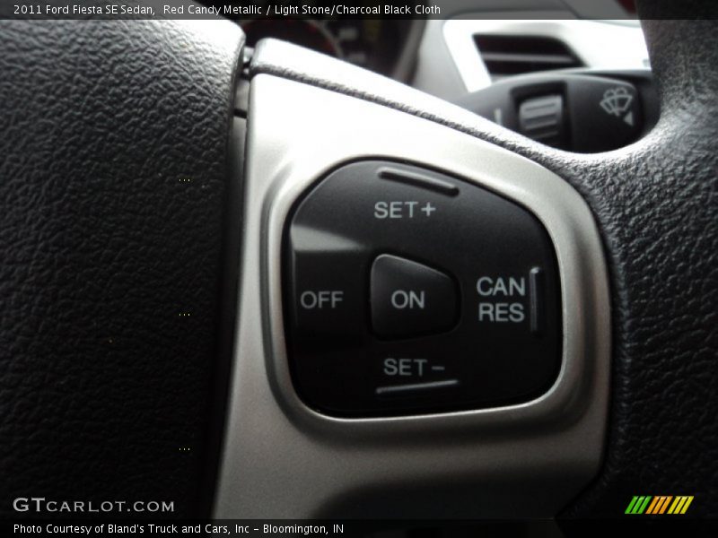 Red Candy Metallic / Light Stone/Charcoal Black Cloth 2011 Ford Fiesta SE Sedan