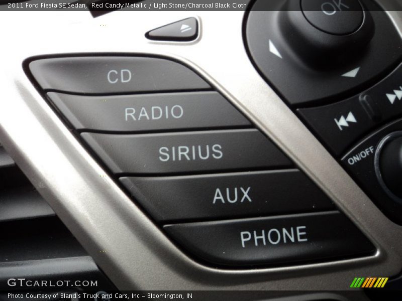 Red Candy Metallic / Light Stone/Charcoal Black Cloth 2011 Ford Fiesta SE Sedan