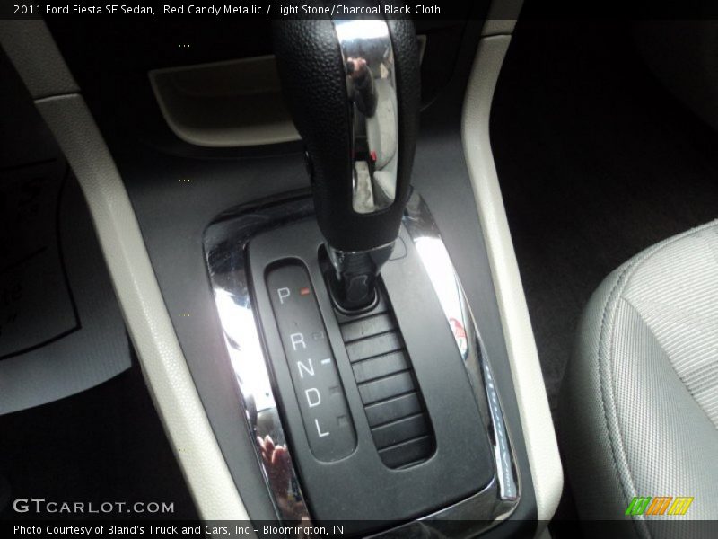 Red Candy Metallic / Light Stone/Charcoal Black Cloth 2011 Ford Fiesta SE Sedan