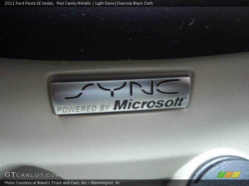 Red Candy Metallic / Light Stone/Charcoal Black Cloth 2011 Ford Fiesta SE Sedan