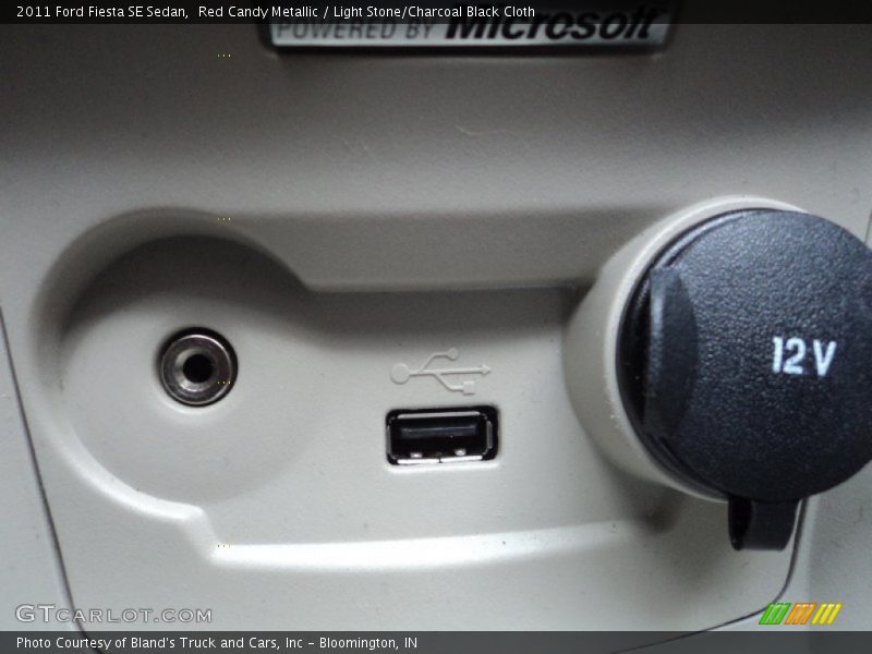 Red Candy Metallic / Light Stone/Charcoal Black Cloth 2011 Ford Fiesta SE Sedan