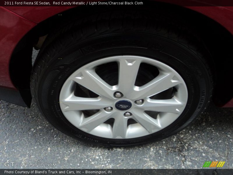 Red Candy Metallic / Light Stone/Charcoal Black Cloth 2011 Ford Fiesta SE Sedan