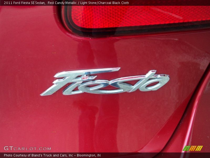 Red Candy Metallic / Light Stone/Charcoal Black Cloth 2011 Ford Fiesta SE Sedan