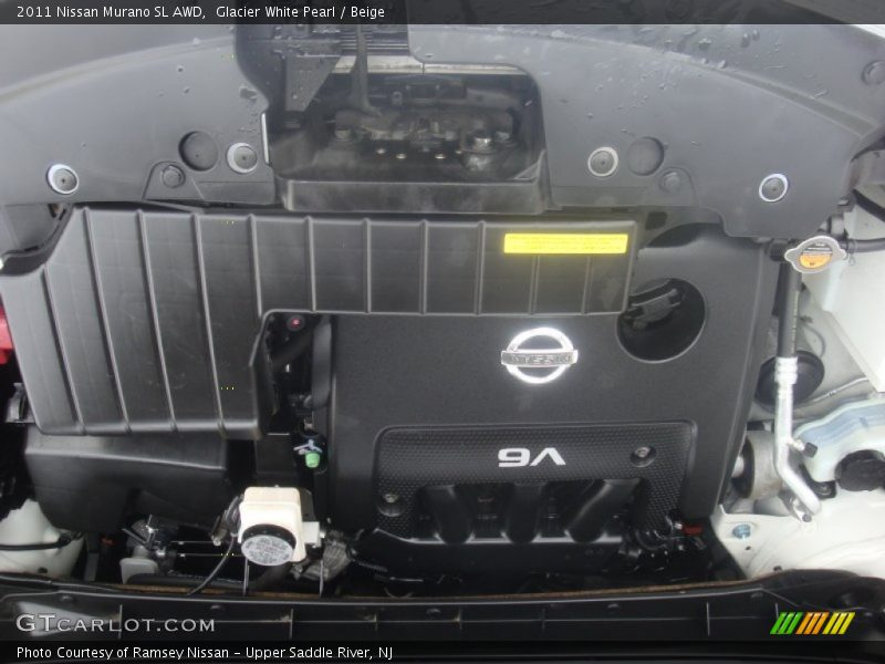 Glacier White Pearl / Beige 2011 Nissan Murano SL AWD