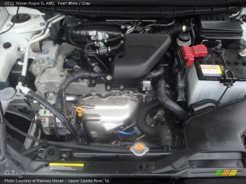 Pearl White / Gray 2012 Nissan Rogue SL AWD