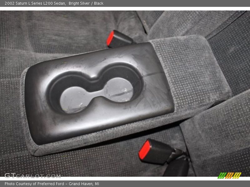 Bright Silver / Black 2002 Saturn L Series L200 Sedan