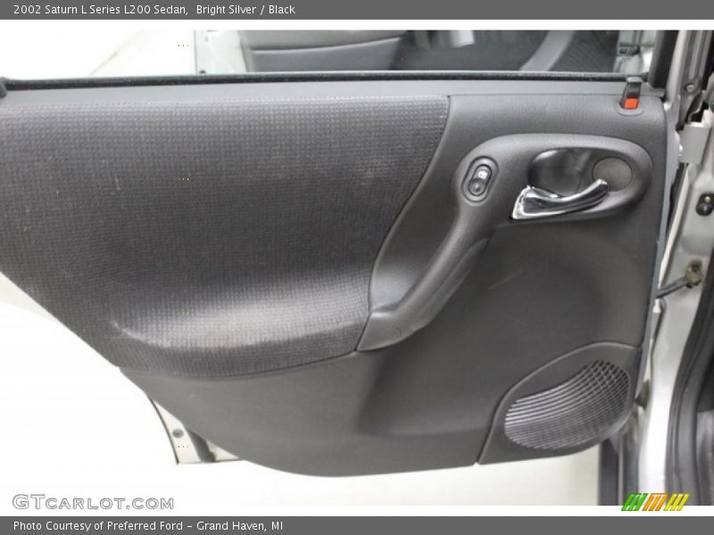 Bright Silver / Black 2002 Saturn L Series L200 Sedan