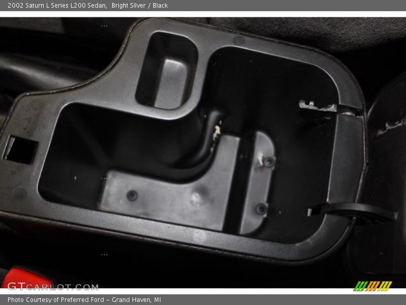 Bright Silver / Black 2002 Saturn L Series L200 Sedan