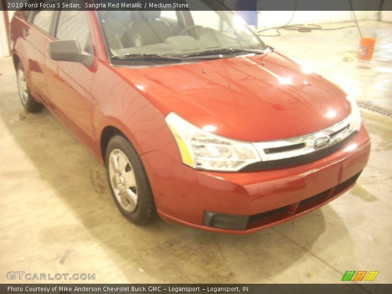 Sangria Red Metallic / Medium Stone 2010 Ford Focus S Sedan