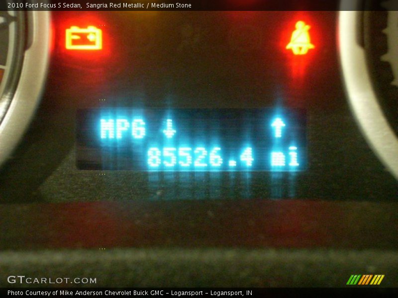 Sangria Red Metallic / Medium Stone 2010 Ford Focus S Sedan