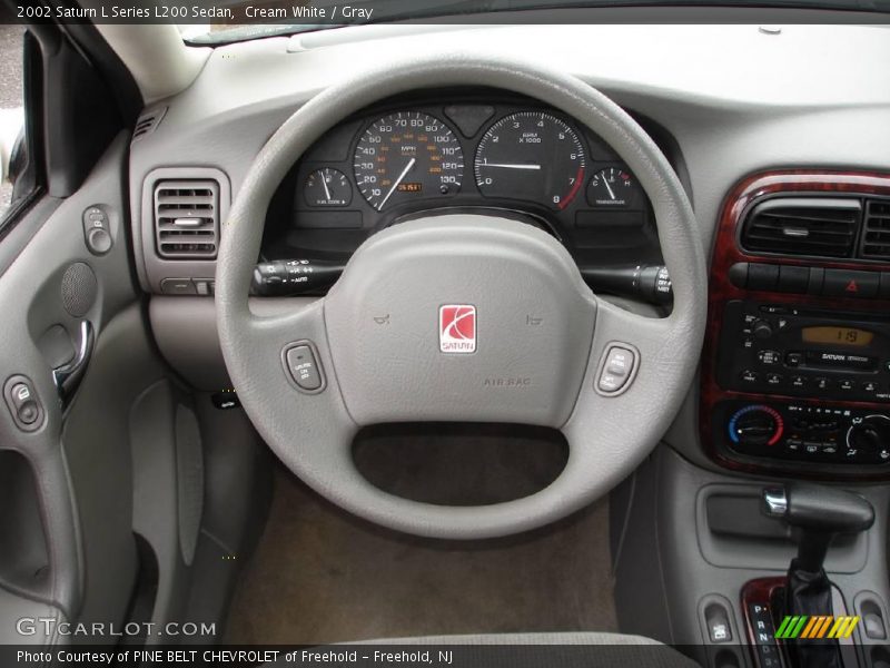 Cream White / Gray 2002 Saturn L Series L200 Sedan