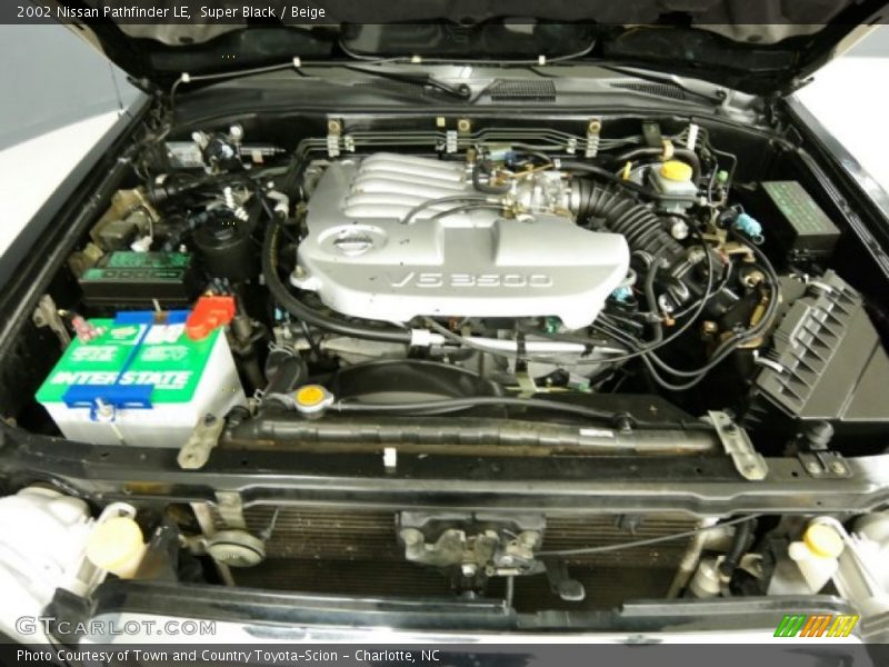 Super Black / Beige 2002 Nissan Pathfinder LE