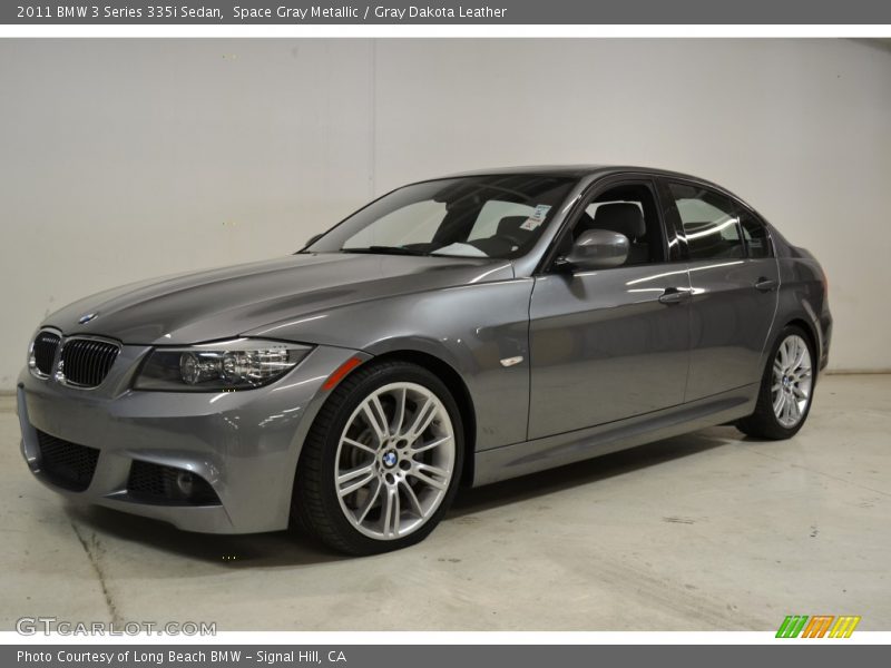 Front 3/4 View of 2011 3 Series 335i Sedan