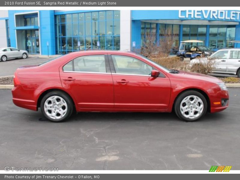 Sangria Red Metallic / Medium Light Stone 2010 Ford Fusion SE