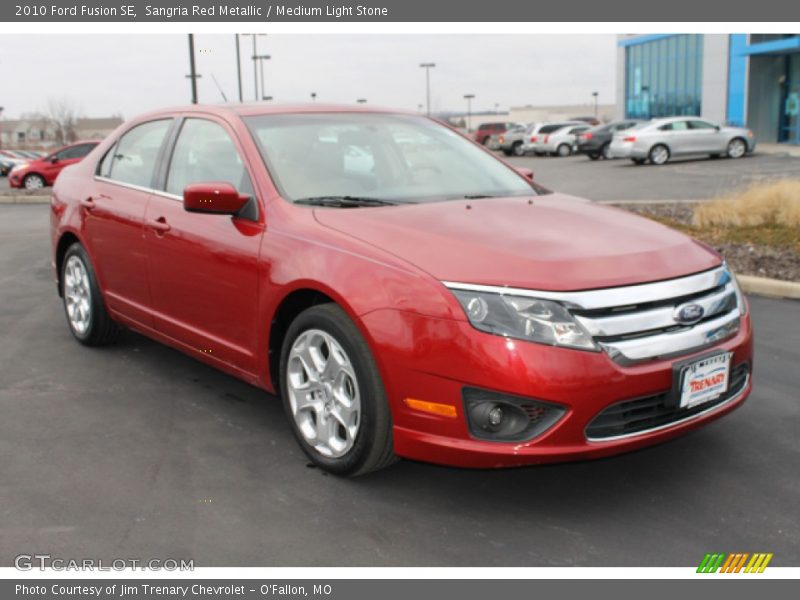 Sangria Red Metallic / Medium Light Stone 2010 Ford Fusion SE