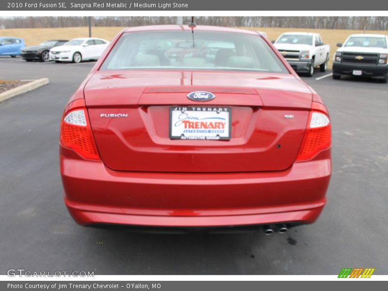 Sangria Red Metallic / Medium Light Stone 2010 Ford Fusion SE