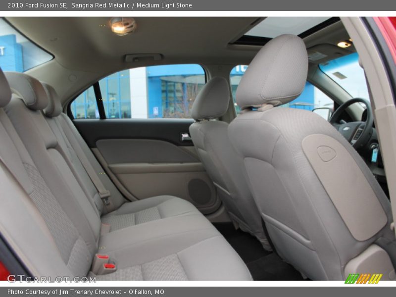 Sangria Red Metallic / Medium Light Stone 2010 Ford Fusion SE