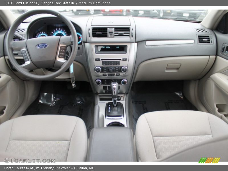 Sangria Red Metallic / Medium Light Stone 2010 Ford Fusion SE