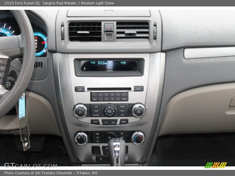 Sangria Red Metallic / Medium Light Stone 2010 Ford Fusion SE