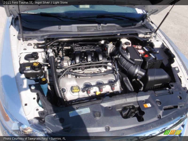 Ingot Silver / Light Stone 2011 Ford Taurus SE