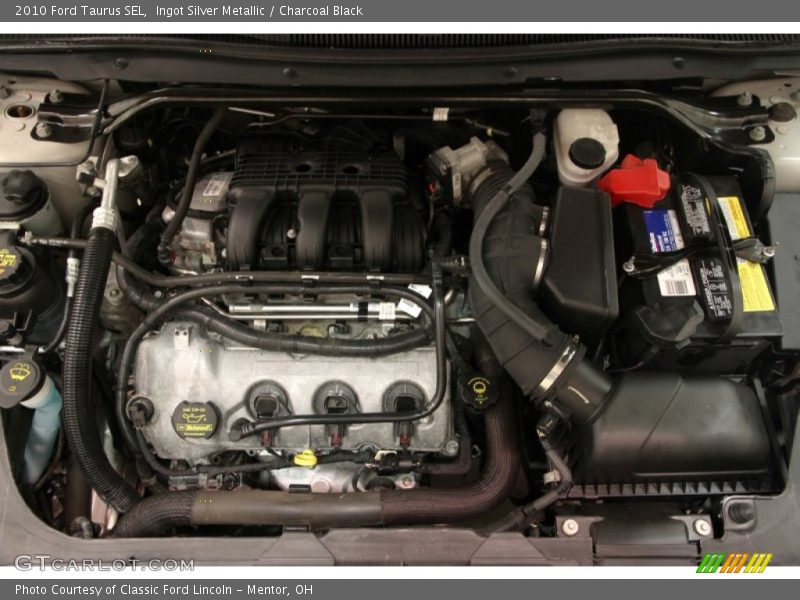 Ingot Silver Metallic / Charcoal Black 2010 Ford Taurus SEL