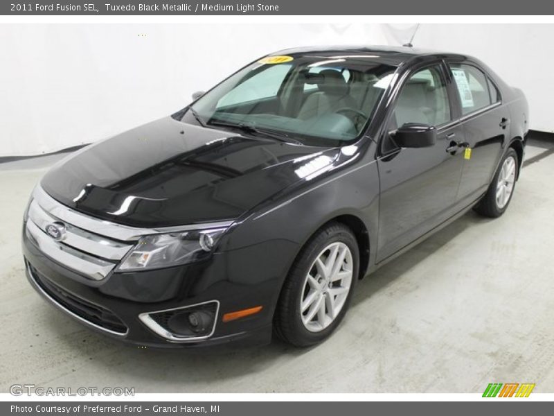 Tuxedo Black Metallic / Medium Light Stone 2011 Ford Fusion SEL