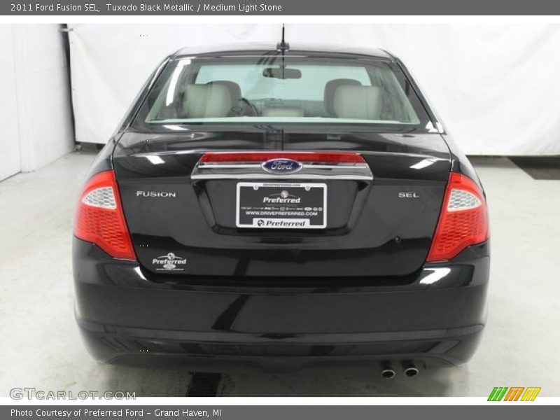 Tuxedo Black Metallic / Medium Light Stone 2011 Ford Fusion SEL