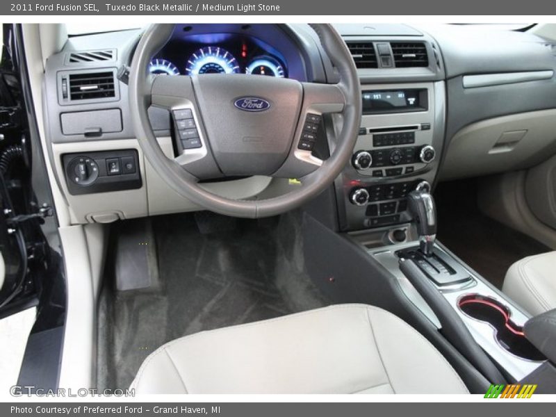 Tuxedo Black Metallic / Medium Light Stone 2011 Ford Fusion SEL