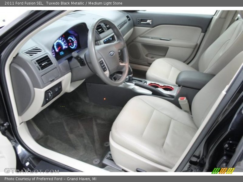 Tuxedo Black Metallic / Medium Light Stone 2011 Ford Fusion SEL