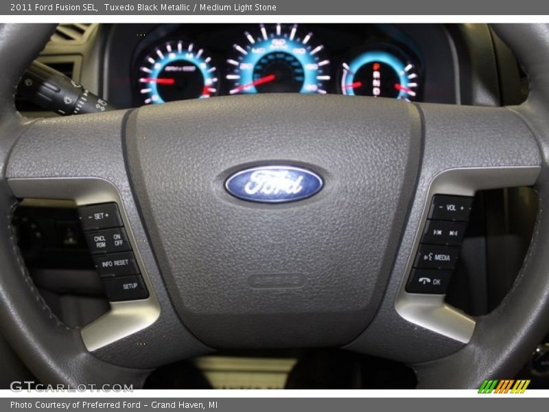 Tuxedo Black Metallic / Medium Light Stone 2011 Ford Fusion SEL
