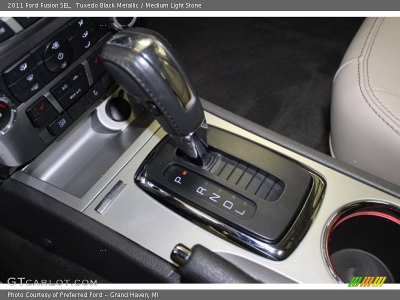 Tuxedo Black Metallic / Medium Light Stone 2011 Ford Fusion SEL
