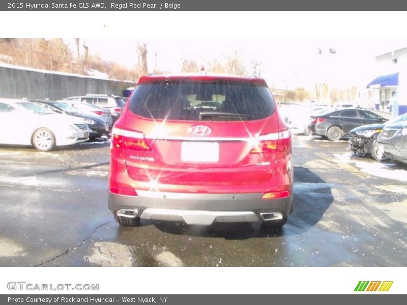 Regal Red Pearl / Beige 2015 Hyundai Santa Fe GLS AWD