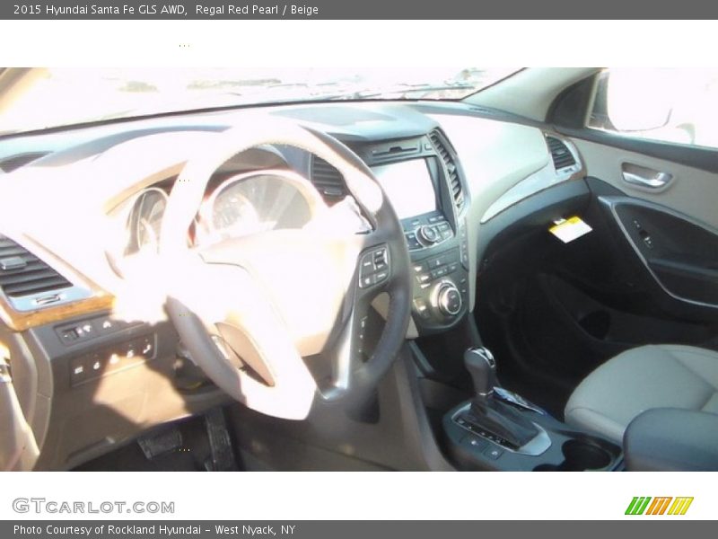 Regal Red Pearl / Beige 2015 Hyundai Santa Fe GLS AWD