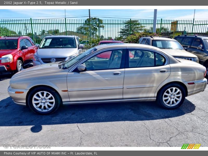 Topaz Metallic / Sand 2002 Jaguar X-Type 2.5