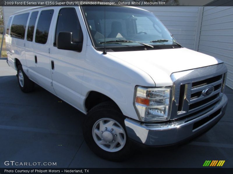 Front 3/4 View of 2009 E Series Van E350 Super Duty XL Extended Passenger