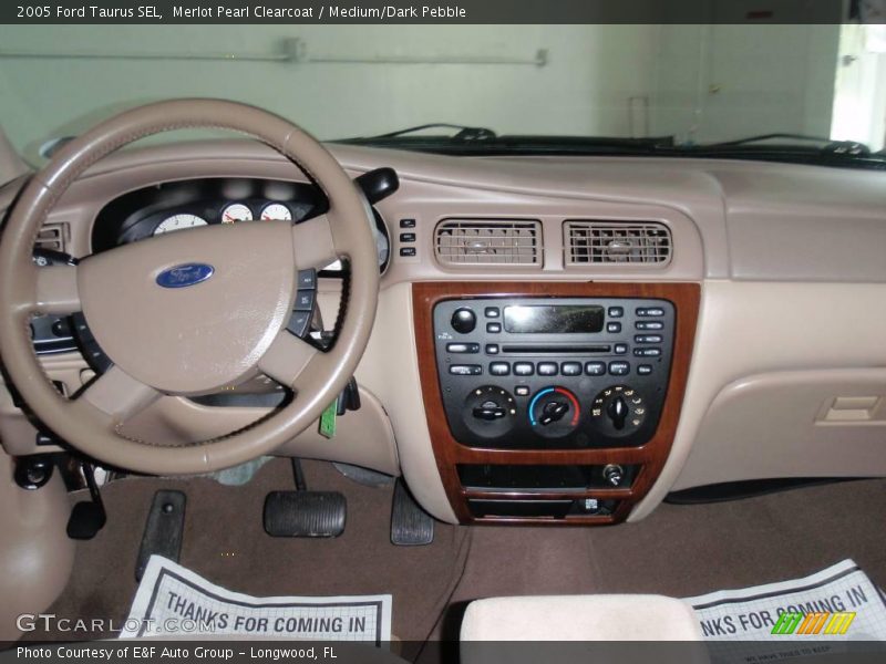 Merlot Pearl Clearcoat / Medium/Dark Pebble 2005 Ford Taurus SEL