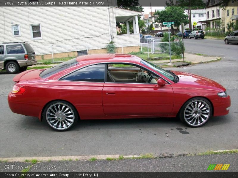 Red Flame Metallic / Ivory 2002 Toyota Solara SE Coupe