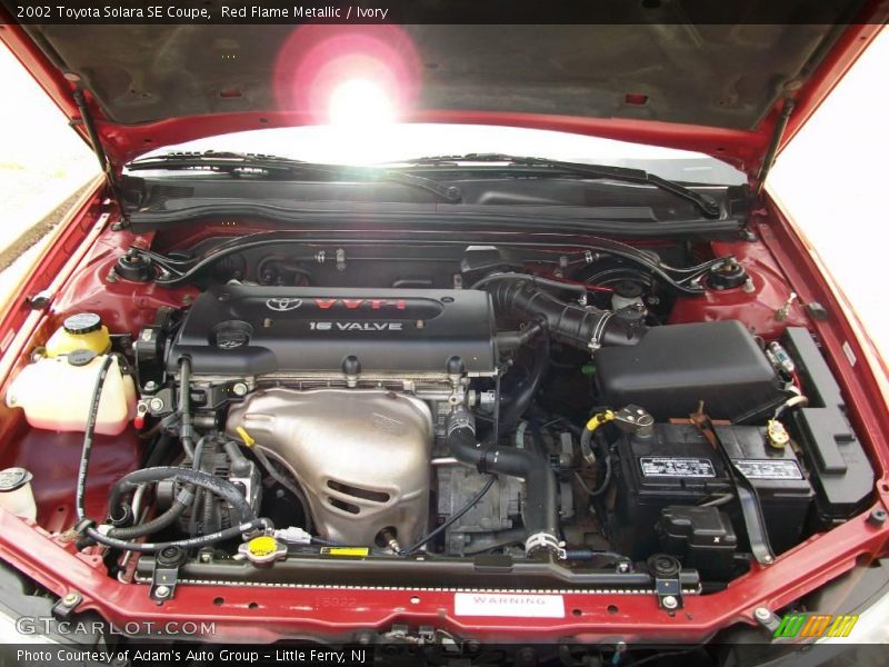 Red Flame Metallic / Ivory 2002 Toyota Solara SE Coupe