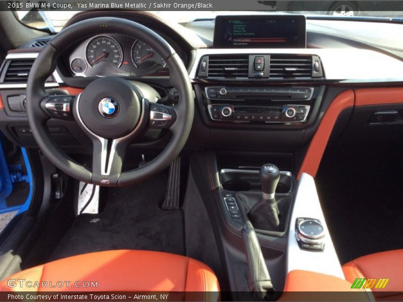 Yas Marina Blue Metallic / Sakhir Orange/Black 2015 BMW M4 Coupe