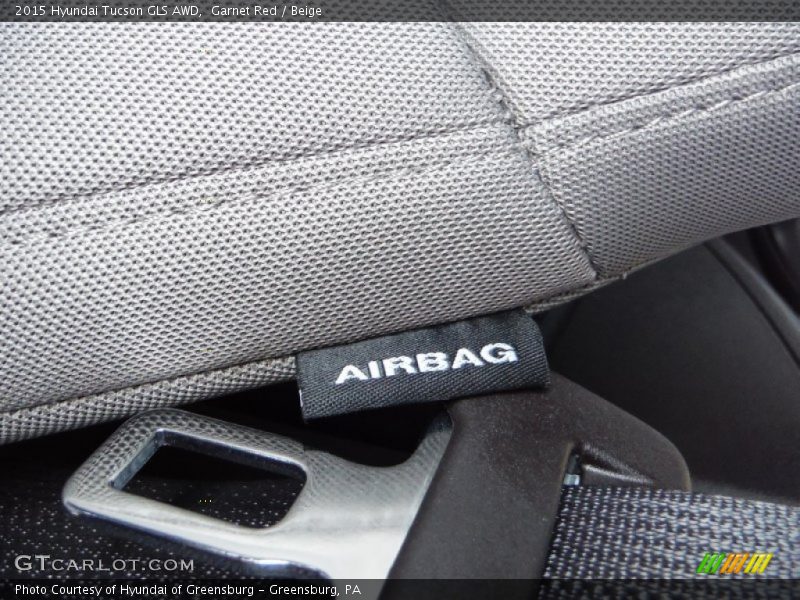 Garnet Red / Beige 2015 Hyundai Tucson GLS AWD