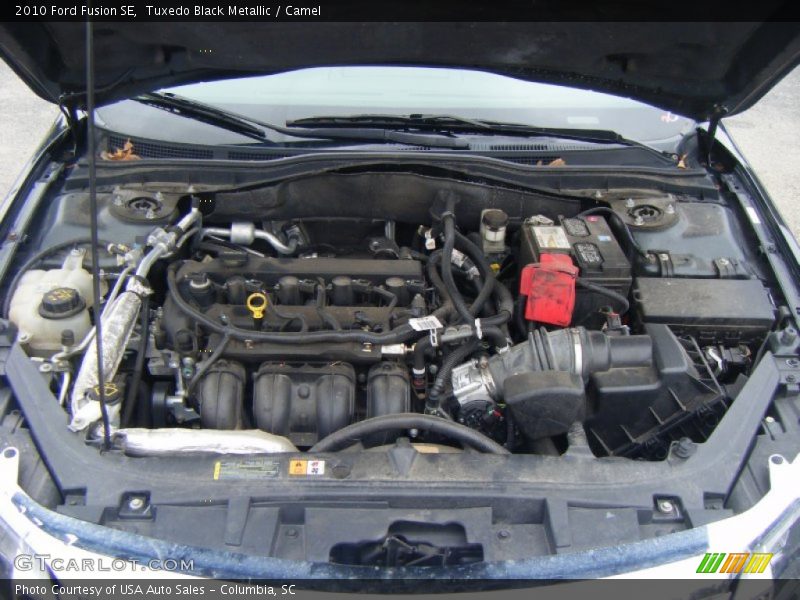 Tuxedo Black Metallic / Camel 2010 Ford Fusion SE