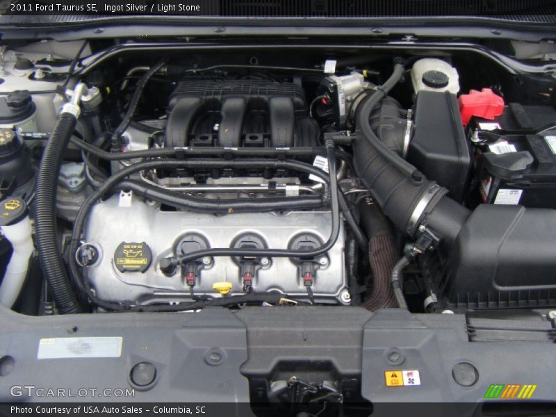 Ingot Silver / Light Stone 2011 Ford Taurus SE