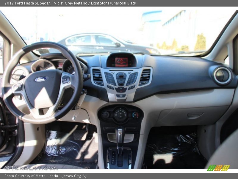 Violet Grey Metallic / Light Stone/Charcoal Black 2012 Ford Fiesta SE Sedan