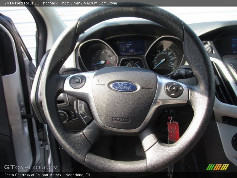 Ingot Silver / Medium Light Stone 2014 Ford Focus SE Hatchback