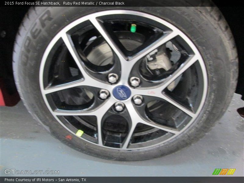 Ruby Red Metallic / Charcoal Black 2015 Ford Focus SE Hatchback